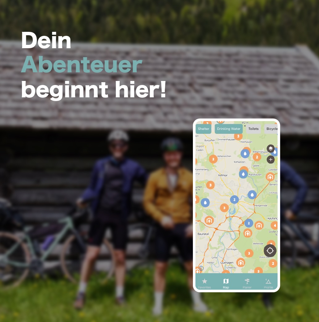 Bikepacker in front of shelter